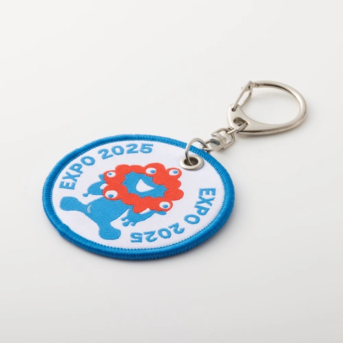 EXPO2025 ミャクミャク丸型織キーホルダー 座り